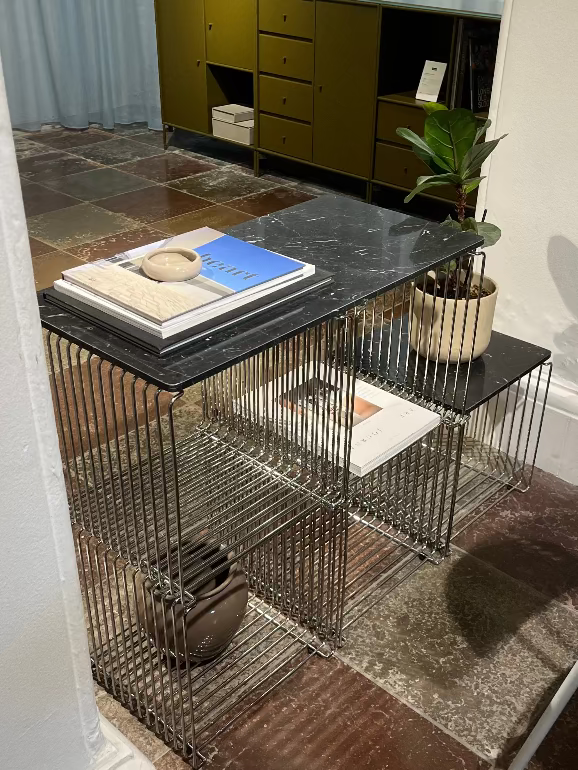 montana wire shelving with marble top and chrome wires. modern storage.