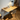 AB019 oak wall hung desk by Anker Bak for Carl Hansen with chair in a room with a lamp and decor items.