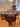 Fritz Hansen's Round After marble table with four matching chairs in a room with wooden flooring and Egg chair in background