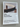 Poster of a After chair design by Michael Anastassiades on a gray wall at Fritz Hansen Store Copenhagen 2025