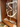 Decorative metal sculpture on a wooden shelf of the template of a grand prix chair as part of Fritz Hansen's archive in their Copenhagen store
