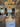 Louis Poulsen display with various lamps in a showroom setting. Display of modern lamps at a showroom with people observing. Louis Poulsen Copenhagen showroom during 2025 3 Days of Design. Artichoke pendants.