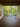 Modern room with large glass window overlooking trees at Lousiana Museum of Modern Art in Denmark