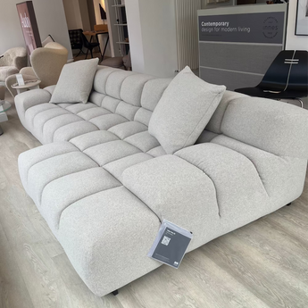 B&B Italia Tufty-Time 20 modular sofa in light greige fabric in furniture store Innes