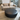 B&B Italia HL110P Large Ottoman in darkgrey brown leather and Hay Mags soft sofa in beige fabric in Innes showroom in hessle 2025