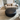 B&B Italia HL110P Large Ottoman in dark grey brown leather and Hay Mags soft sofa in beige fabric  and Montana white shelving in Innes showroom in hessle 2025