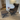 Vitra Grand Repos lounge chair and ottoman in brown Cosy fabric on oak loor with becky innes art print at Innes showroom in Hessle, East Yorkshire
