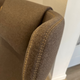 close up of vitra cosy wool brown fabric on grand repos showing contrasting stitching
