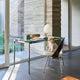 Knoll Florence Knoll Mini Desk in Clear Glass — lifestyle, with Saarinen Executive Chair