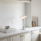 Louis Poulsen PH 2/1 Portable Table Lamp in High Lustre Chrome Plated — lifestyle, living room