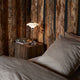 Louis Poulsen PH 2/1 Portable Table Lamp in High Lustre Chrome Plated — lifestyle, bedroom