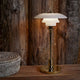 Louis Poulsen PH 2/1 Portable Table Lamp in Brass Metallised — lifestyle