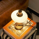 Louis Poulsen PH 2/2 Luna Aged Brass Opal Table Lamp — lifestyle, detail 03