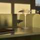 Louis Poulsen PH 80 Portable Lamp in Opal White / White — lifestyle, living room detail, lamp on