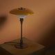 Louis Poulsen PH 3/2 Table Lamp Centenary Edition — lifestyle, unlit view 1