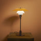 Louis Poulsen PH 3/2 Table Lamp Centenary Edition — lifestyle view illuminated 2