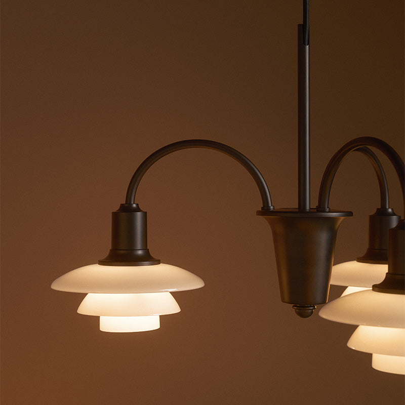 Louis Poulsen PH 1/1 Chandelier Centenary Edition 3-arm close-up detail, illuminated 1