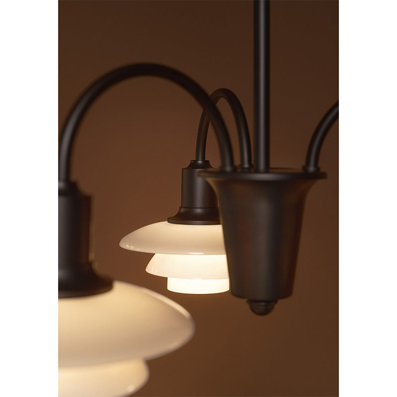 Louis Poulsen PH 1/1 Chandelier Centenary Edition 3-arm close-up detail, illuminated 2