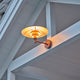 Louis Poulsen PH 4½-3 Wall Light in Brushed Copper — lifestyle, exterior