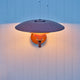 Louis Poulsen PH 4½-3 Wall Light in Brushed Copper — lifestyle, exterior