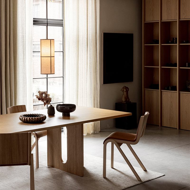 Audo Hashira Pendant Light — lifestyle, with Audo Androgyne Dining Table, Audo Harbour Side Dining Chair, and Audo NNDW