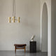 Audo Collector Chandelier 3 — lifestyle, with Elizabeth Ottoman, Plinth Tall