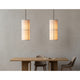 Audo Hashira Pendant Light — lifestyle, with Audo Androgyne Rectangular Dining Table and Audo Harbour Side Dining Chair