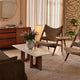 Audo Knitting Lounge Chair Sheepskin — lifestyle, with Androgyne Lounge Table, Umanoff Side Table and Gravel Rug