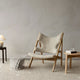 Audo Knitting Lounge Chair Sheepskin — lifestyle, with Ribbon Basket, Houkime Rug and Torso Table Lamp