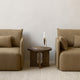 Audo Offset 2 Seater Sofa in Bouclé — lifestyle, with Androgyne Side Table, Umanoff Candle Holder and Gravel Rug