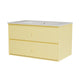 A pale yellow two-drawer cabinet with a speckled white sink countertop and integrated sink, shown on a plain white background.