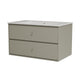 A two-drawer storage cabinet with a speckled white countertop and integrated sink, finished in a warm gray or taupe color.