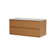 A modern two-drawer cabinet with a warm tan finish and a white speckled sink top, shown on a plain white background.