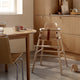 Carl Hansen ND54 High Chair With Baby Backrest in Beech Lacquer — lifestyle, with OW224 Table