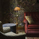 Louis Poulsen Panthella 250 Portable The Originals — Original Brown illuminated in a hotel interior setting
