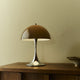 Louis Poulsen Panthella 250 Portable The Originals — Original Brown illuminated, lifestyle view 1