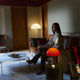 Louis Poulsen Panthella 250 Portable The Originals — Original Opal Red illuminated, lifestyle view 3