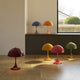 Louis Poulsen Panthella 250 Portable Lamp — Multiple colourways in a family living room setting, view 3
