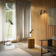 Louis Poulsen AJ Floor Lamp, Louis Poulsen AJ Table Lamp and  Louis Poulsen AJ Wall Light lifestyle AJ family living room setting illuminated