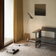 Louis Poulsen AJ Floor Lamp Warm Grey Brass lifestyle living room setting