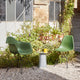 Vitra Eames Plastic Side Chair RE DSR — lifestyle, with Vitra Eames Plastic Armchair DAR and Metal Side Table Zinc