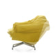 Vitra Bascule Lowback Lounge Chair in Iroko 2 Lemon — packshot, in motion