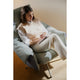 Vitra Bascule Highback Lounge Chair in Cento Light Sage and Light Lavender, Chalk base — studio, detail, with model