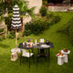 Vitra Belleville Chair Plastic in Cream — lifestyle, outdoor garden, with Vitra Belleville Armchair and Belleville Table
