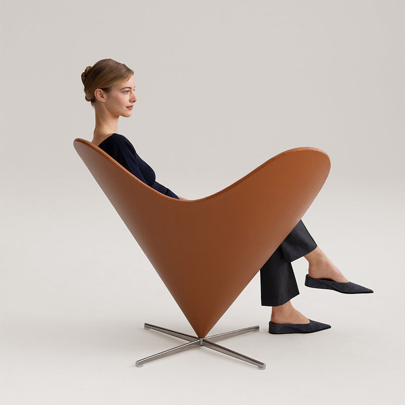 Vitra Heart Cone Chair in Leather Premium Cognac — lifestyle with model
