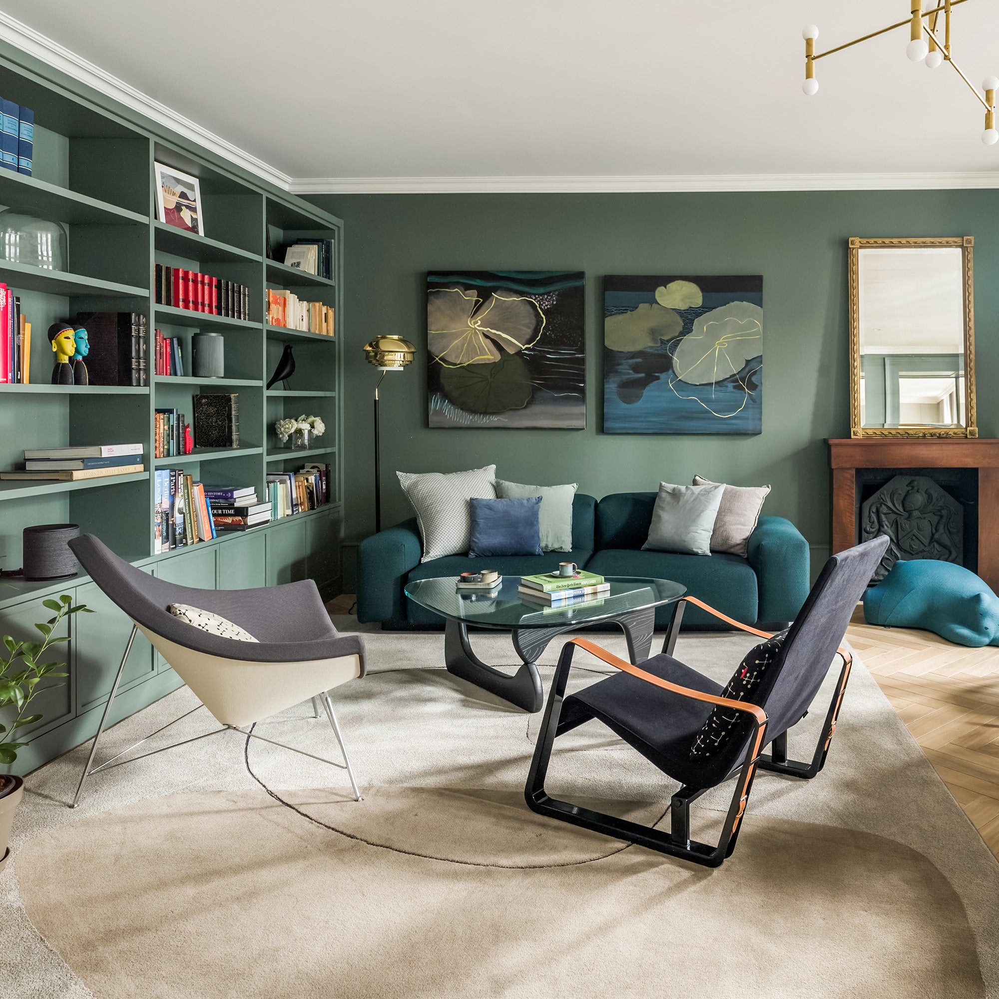 Vitra Noguchi Coffee Table — lifestyle, with Vitra Coconut Chair and Cité Lounge Chair