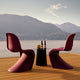 Vitra Panton Dining Chair in Bordeaux — lifestyle, rooftop terrace with Metal Side Table