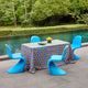 Vitra Panton Dining Chair in Glacier Blue — lifestyle, poolside dining terrace