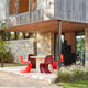 Vitra Panton Dining Chair in Classic Red and Bordeaux — lifestyle, covered dining terrace