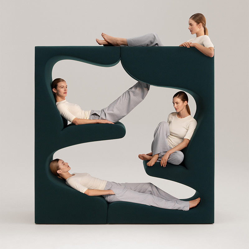 Vitra Living Tower by Verner Panton — lifestyle shot with model showing scale